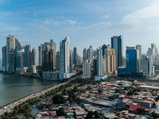 Panama City's contemporary skyline featuring skyscrapers and waterfront, captured under clear skies.